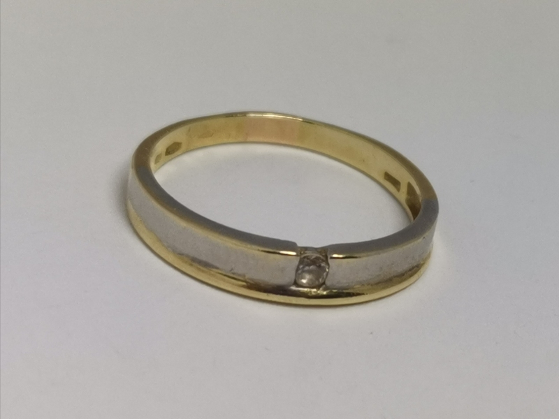 Zlatý dámský prsten s malým zirkonem