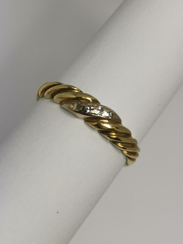 Zlatý dámský prsten se zirkony