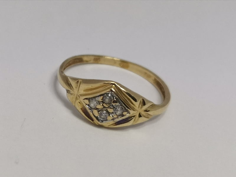 Zlatý dámský prsten se zirkony