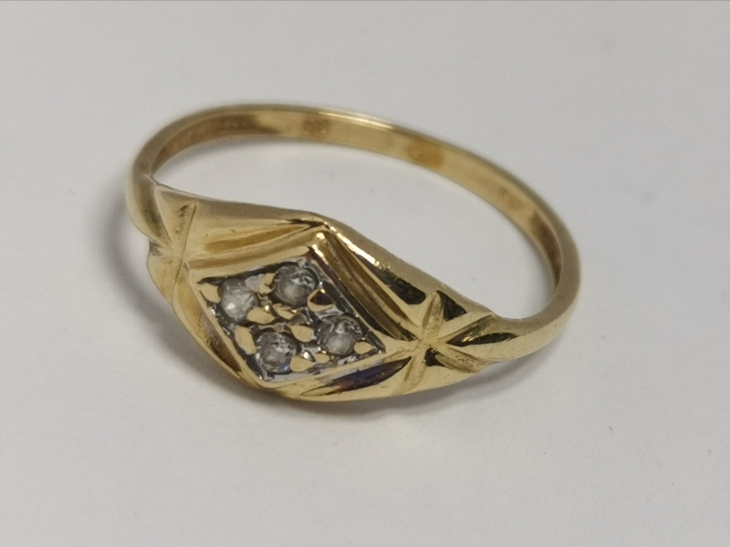 Zlatý dámský prsten se zirkony