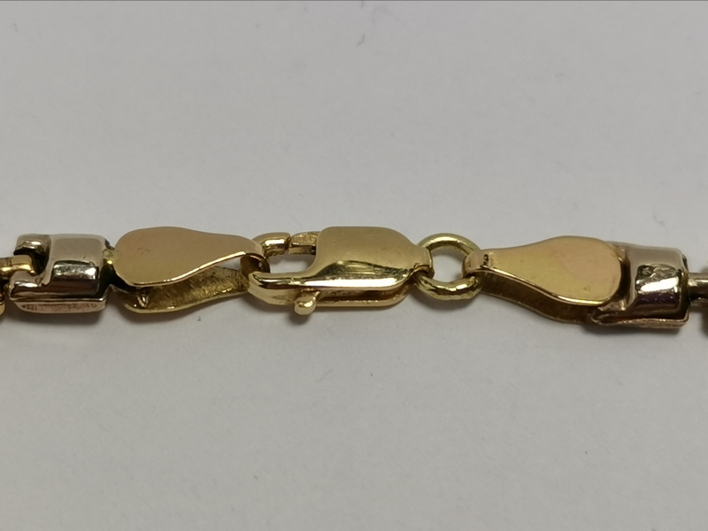 Zlatý dámský náramek ozdobný