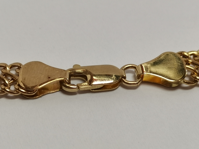 Zlatý dámský náramek ozdobný