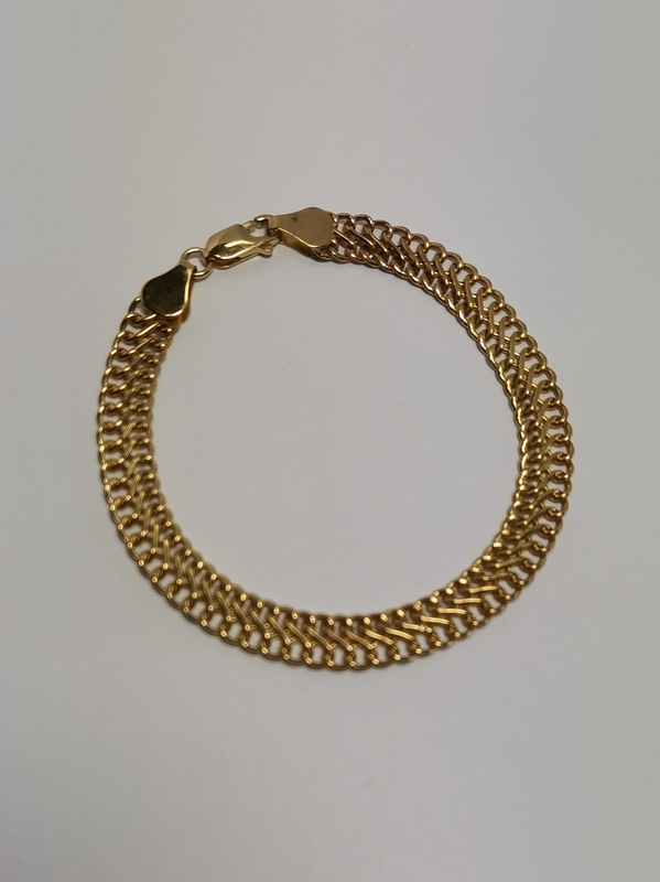 Zlatý dámský náramek ozdobný