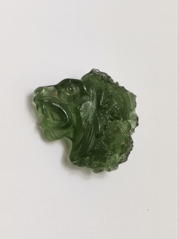 Vltavín glyptika hlava lva