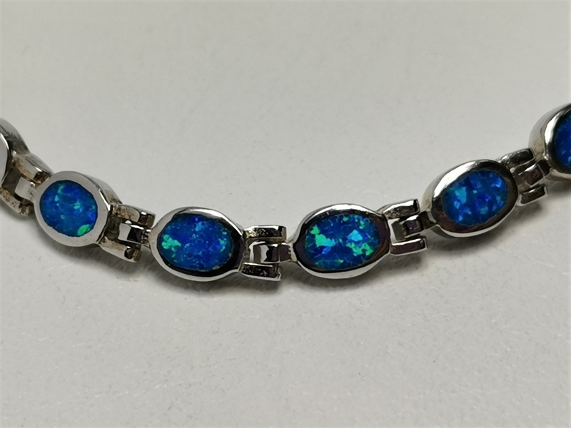 Stříbrný náramek s modrozeleným opálem, rhodiovaný