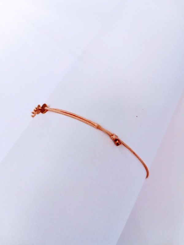 Náramek - růžová šňůrka se stříbrnými, růžově zlacenými kolečky