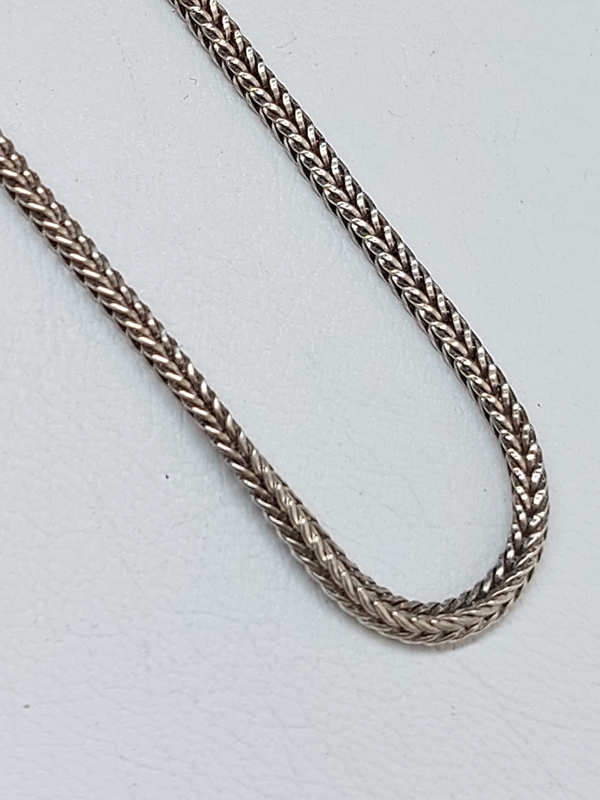 Stříbrný náramek pletený