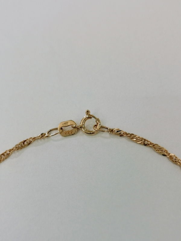 Zlatý dámský náramek lambáda