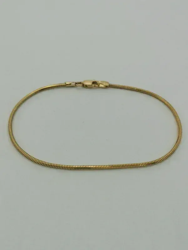 Zlatý dámský náramek kulatý had