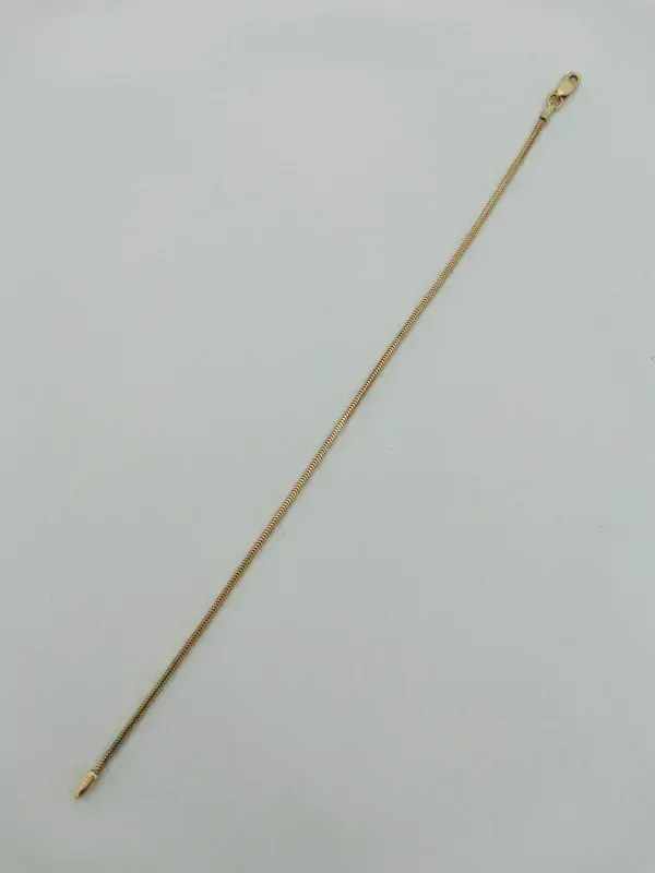 Zlatý dámský náramek kulatý had