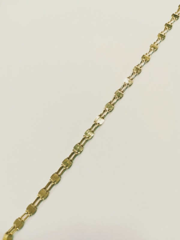 Zlatý náramek "žiletky"