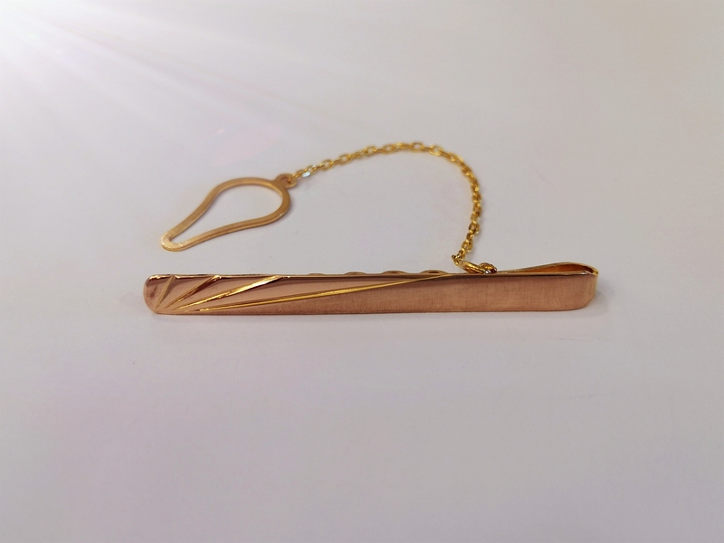 Zlatá kravatová spona